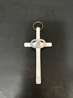 White Ceramic Cross Wall Accent with Blue and Cream Rings